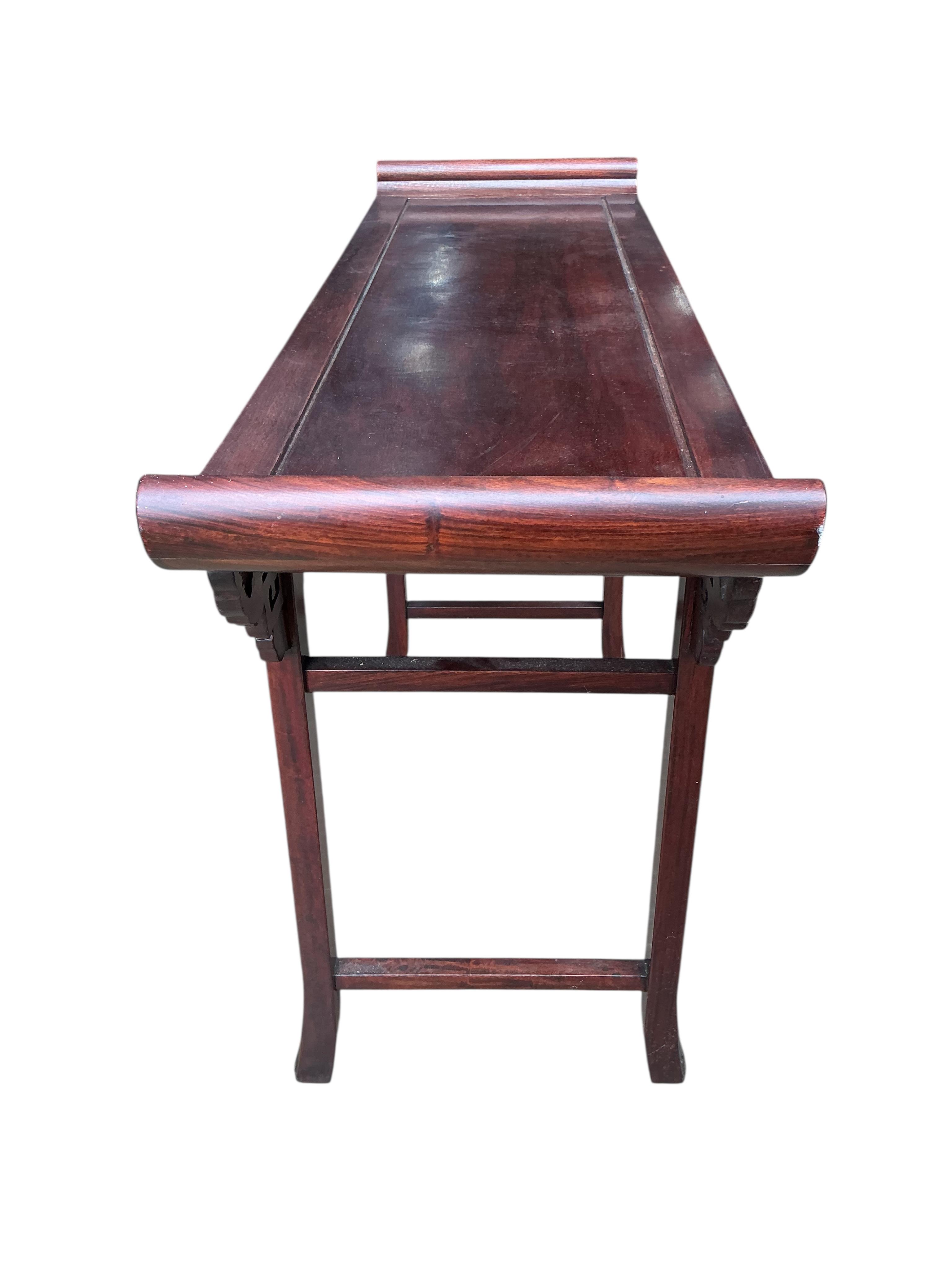 A Chinese altar table, width 122cm, depth 40cm, height 84cm